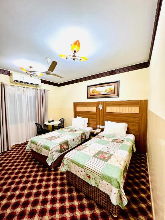 Deluxe Double Room with two twin beds at Al Ahrar Hotel, Deira, Dubai
